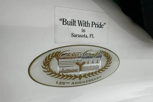 Slide: The Image of Chris-Craft 200 Bowrider SS 1999 emblem, 'Built With Pride' in Sarasota, FL, 125th Anniversary. - 7