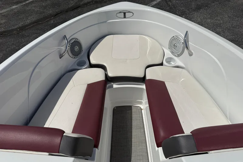 Slide: The Image of Interior of 2020 Tahoe 500 TS boat with maroon and white seating. - 18