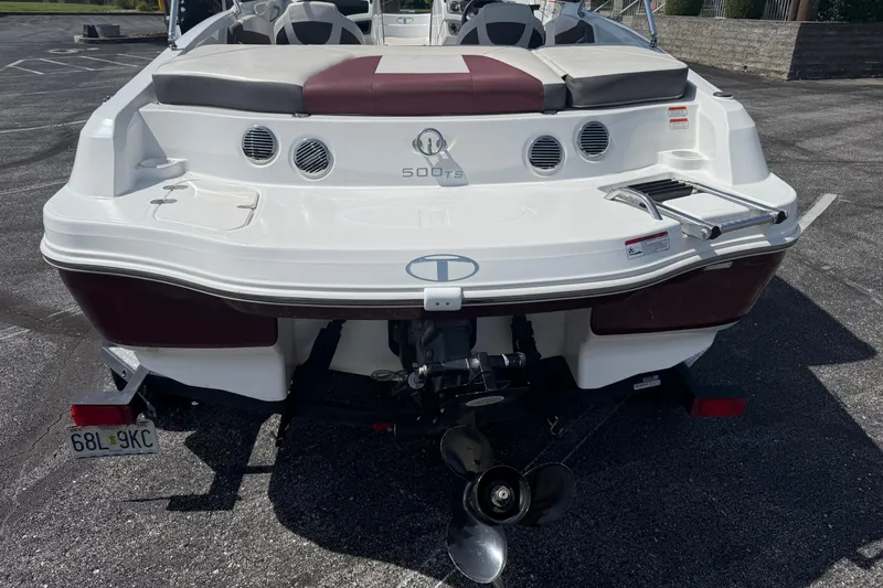 Slide: The Image of Rear view of a 2020 Tahoe 500 TS boat with outboard motor and swim platform. - 5