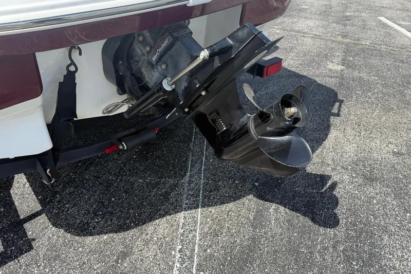 Slide: The Image of Rear view of a 2020 Tahoe 500 TS boat with MerCruiser outdrive. - 7