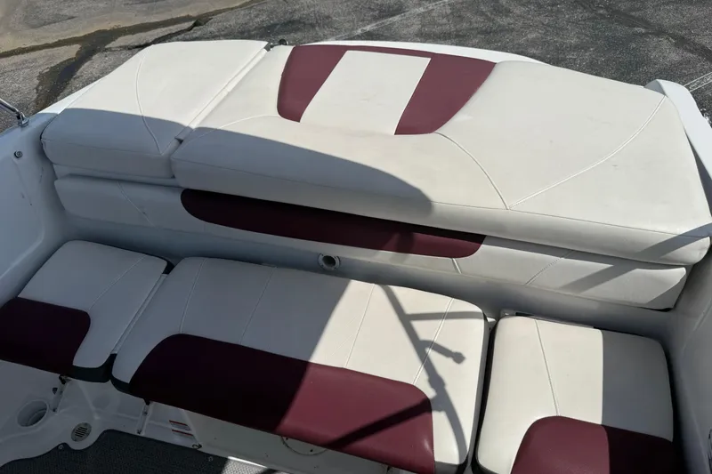 Slide: The Image of White and maroon seating on a 2020 Tahoe 500 TS boat. - 14