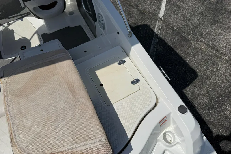 Slide: The Image of 2020 Tahoe 500 TS boat interior with seating and storage compartment. - 11