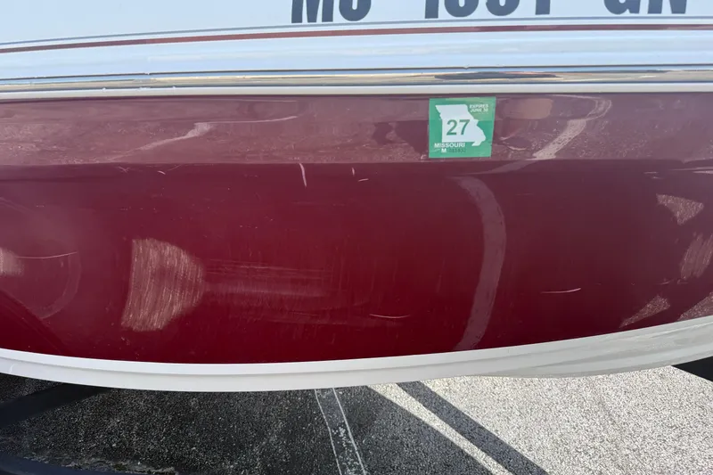 Slide: The Image of Red 2020 Tahoe 500 TS boat with Missouri registration sticker. - 8