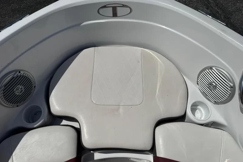 Slide: The Image of Interior of 2020 Tahoe 500 TS boat with cushioned seating and built-in speakers. - 19