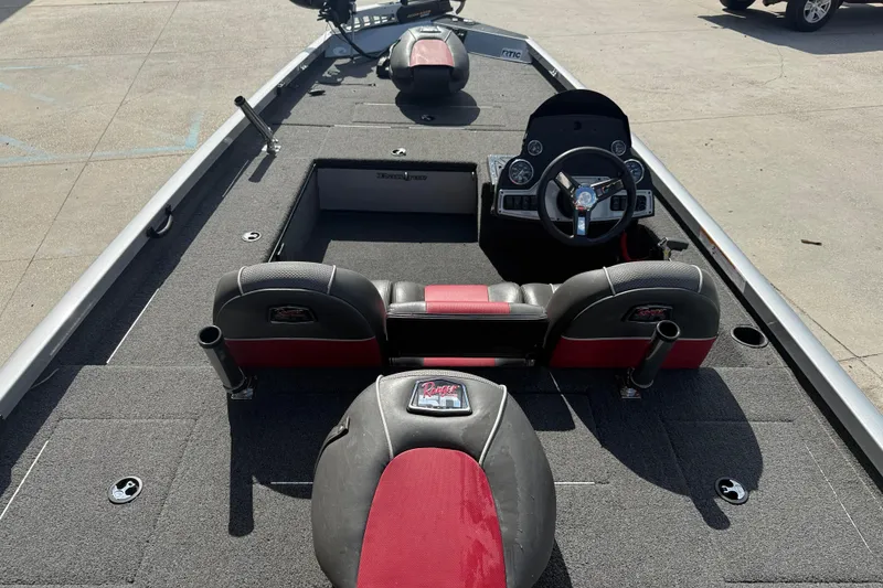 Slide: The Image of 2018 Ranger RT188C fishing boat interior with steering console and seating. - 7