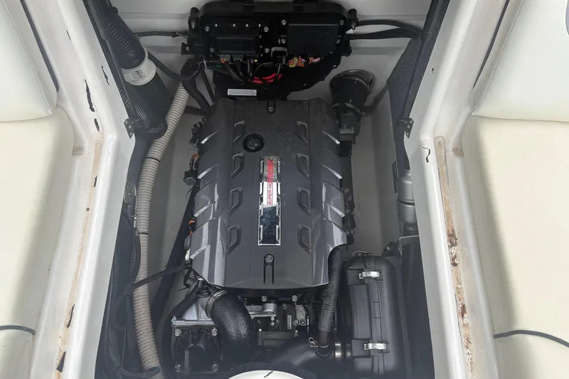 Slide: The Image of 2016 Yamaha Boats AR192 engine compartment, showcasing the engine and surrounding components. - 12