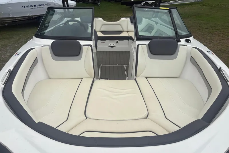 Slide: The Image of 2016 Yamaha Boats AR192 interior with white cushioned seating and open windshield. - 4