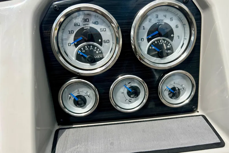 Slide: The Image of Dashboard gauges of 2023 Starcraft SVX 211 IO boat, displaying speed, RPM, and fuel levels. - 47