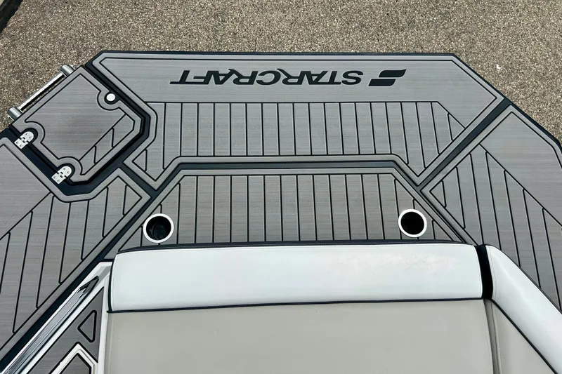 Slide: The Image of 2023 Starcraft SVX 211 IO boat deck with sleek design and modern detailing. - 25