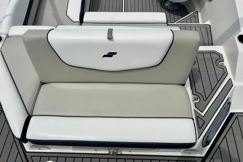 Slide: The Image of 2023 Starcraft SVX 211 IO boat seat with sleek white and gray upholstery. - 38