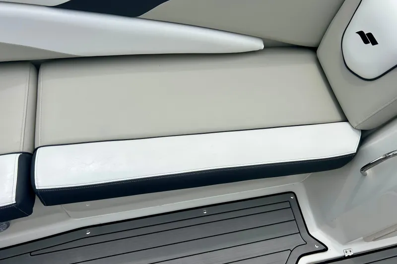 Slide: The Image of 2023 Starcraft SVX 211 IO boat interior with sleek seating and modern design. - 28