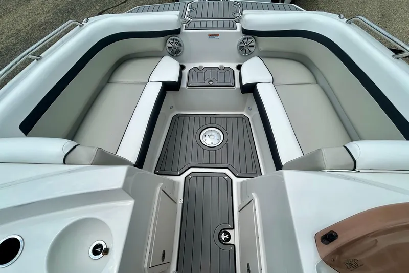 Slide: The Image of 2023 Starcraft SVX 211 IO boat interior with sleek seating and modern design. - 22