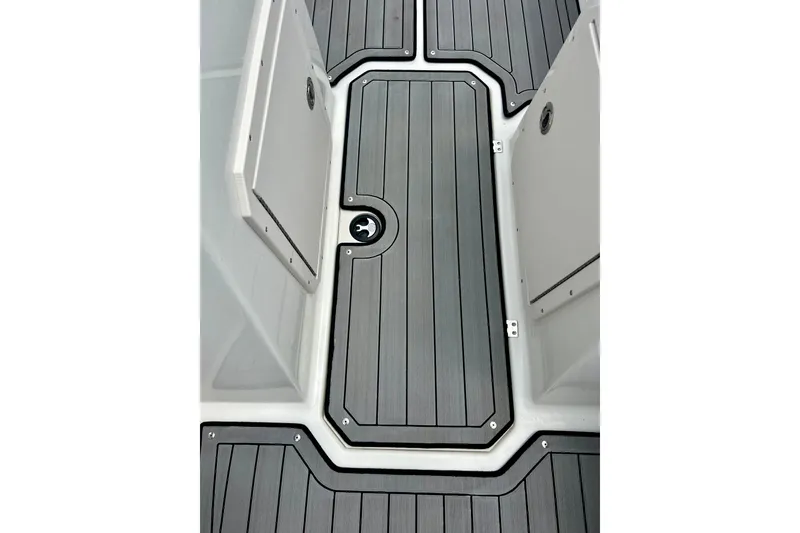 Slide: The Image of 2023 Starcraft SVX 211 IO boat deck with sleek, modern design and durable flooring. - 33
