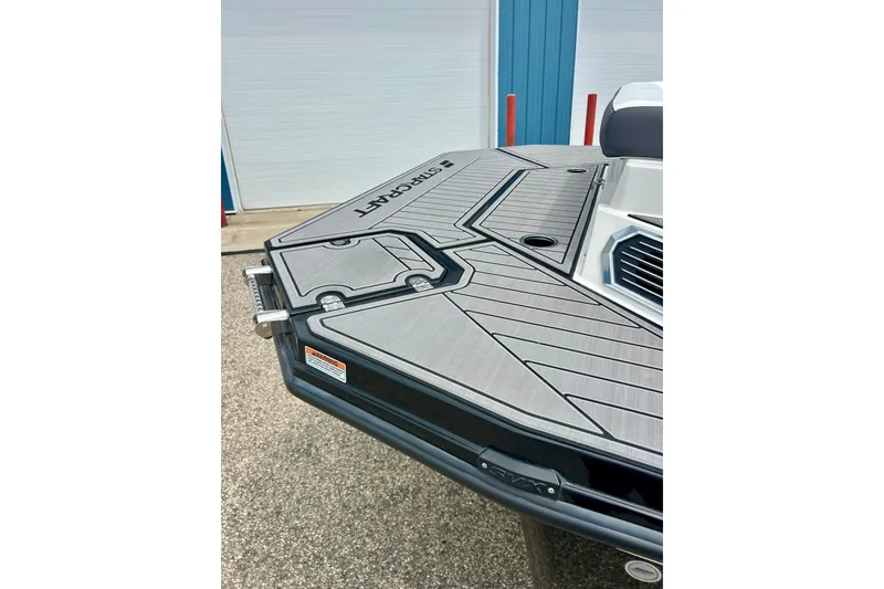 Slide: The Image of 2023 Starcraft SVX 211 IO boat deck with sleek design and modern features. - 27