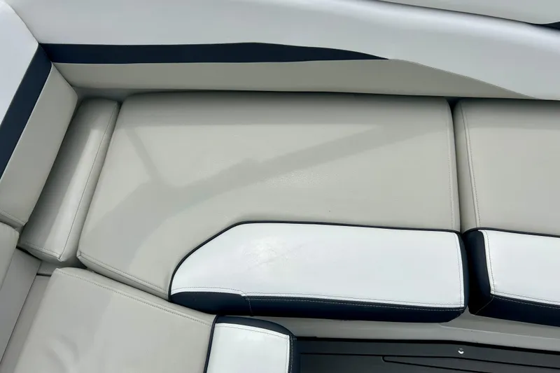 Slide: The Image of 2023 Starcraft SVX 211 IO boat interior with sleek, modern seating design. - 34