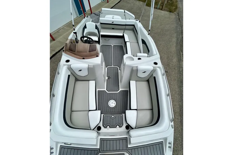 Slide: The Image of 2023 Starcraft SVX 211 IO boat interior with spacious seating and modern design. - 56