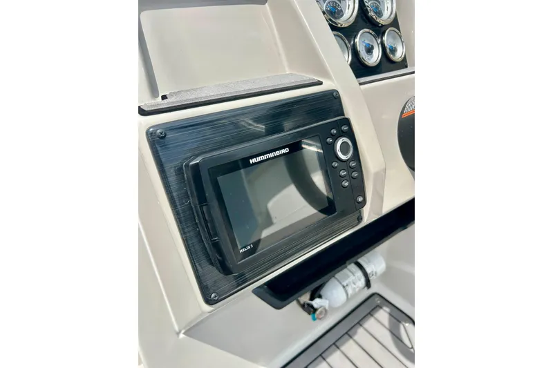 Slide: The Image of Dashboard of 2023 Starcraft SVX 211 IO with Humminbird Helix 5 fishfinder. - 44