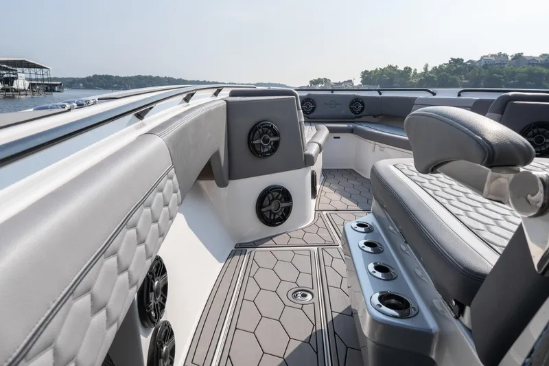 Slide: The Image of 2022 Fountain 38 SC boat interior with luxurious seating and modern design. - 10