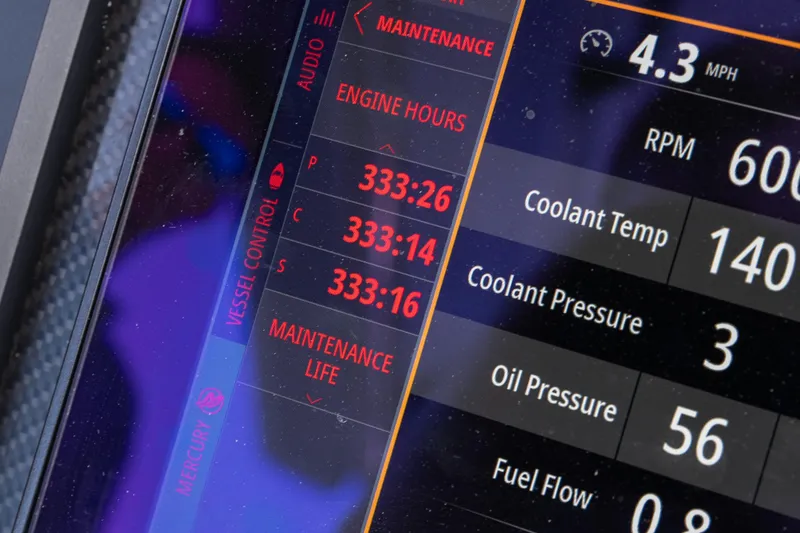 Slide: The Image of Dashboard display of a 2022 Fountain 38 SC boat showing engine hours and maintenance data. - 18