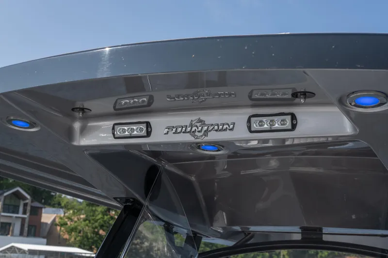 Slide: The Image of 2022 Fountain 38 SC boat canopy with integrated LED lights and logo. - 17