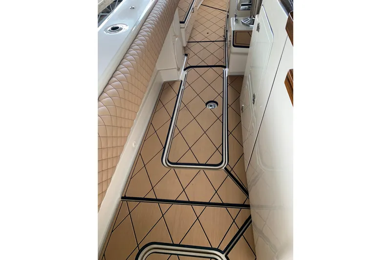 Slide: The Image of Luxurious interior of 2024 HCB 42 Lujo boat with elegant flooring and seating. - 47