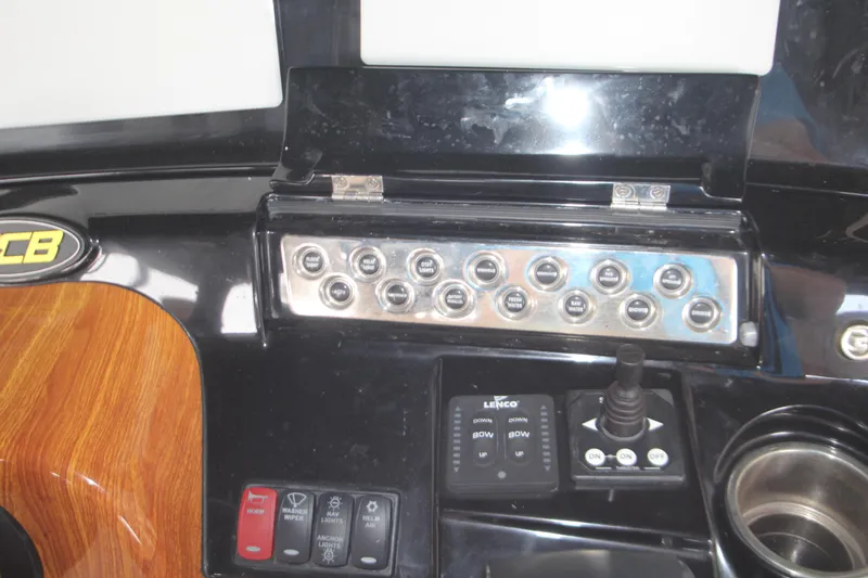 Slide: The Image of Control panel of 2024 HCB 42 Lujo boat with switches and joystick. - 28
