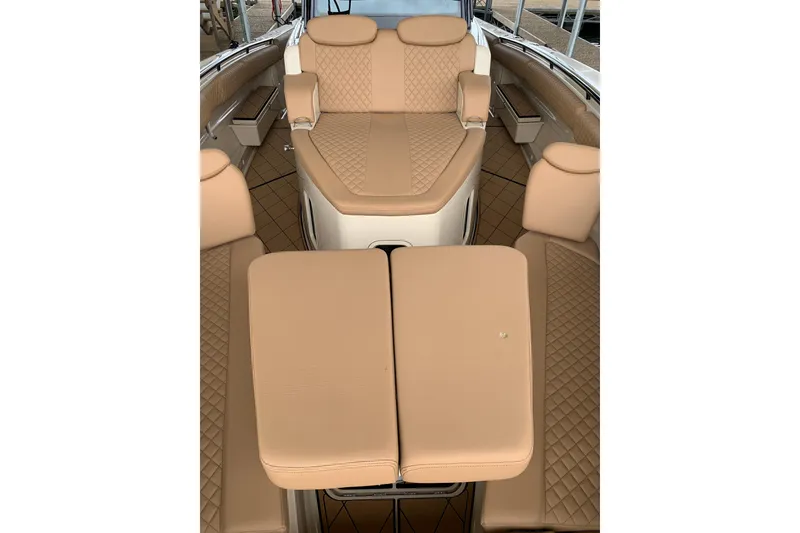 Slide: The Image of Luxurious interior of 2024 HCB 42 Lujo boat with tan leather seating. - 18