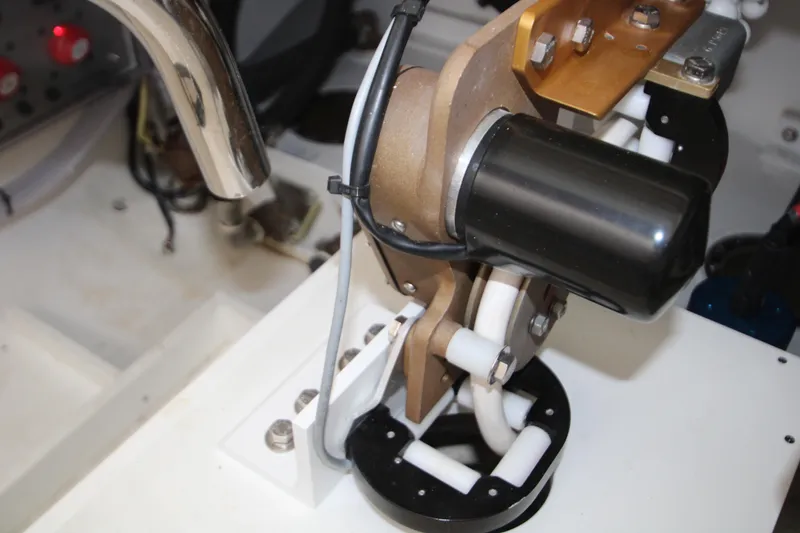 Slide: The Image of Engine component of 2024 HCB 42 Lujo boat, showcasing mechanical details and wiring. - 84