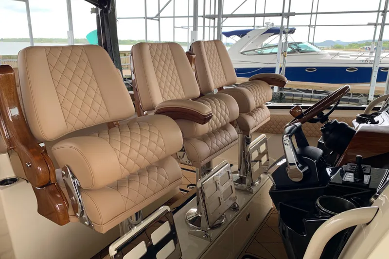 Slide: The Image of Luxurious interior of 2024 HCB 42 Lujo boat with plush, quilted seating. - 11
