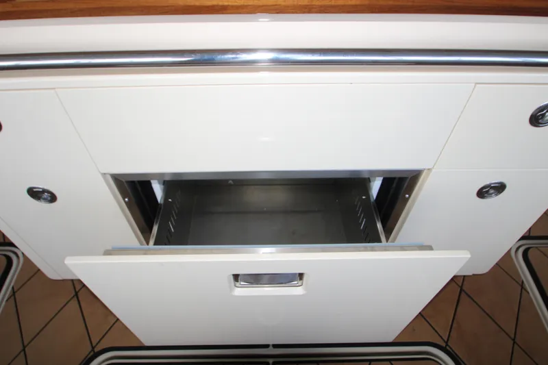 Slide: The Image of Open drawer in 2024 HCB 42 Lujo boat interior, showcasing sleek design and functionality. - 42