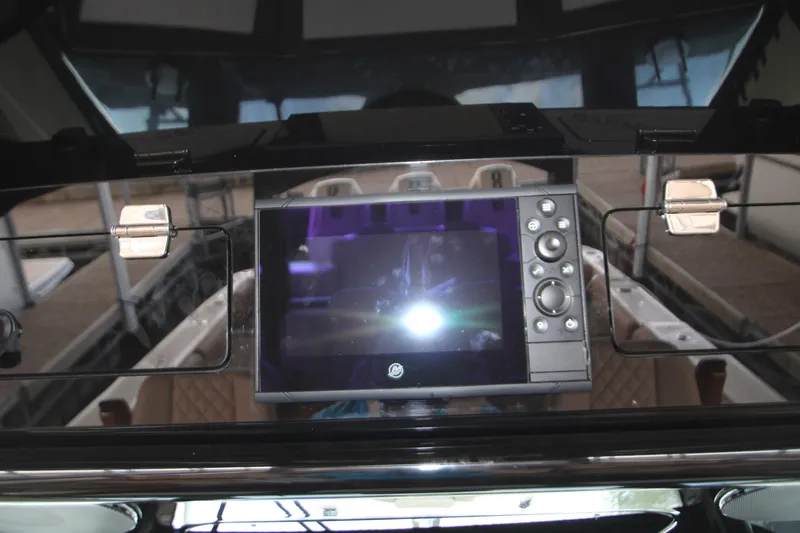 Slide: The Image of 2024 HCB 42 Lujo dashboard with advanced navigation system and controls. - 31