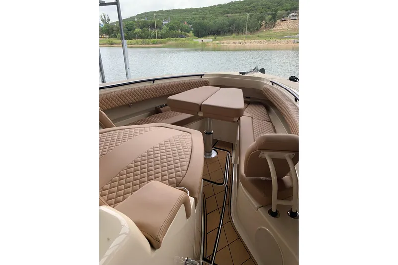 Slide: The Image of Luxurious interior of 2024 HCB 42 Lujo boat with elegant seating and table setup. - 20
