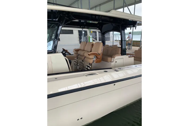 Slide: The Image of 2024 HCB 42 Lujo boat interior with luxurious seating and modern design. - 81