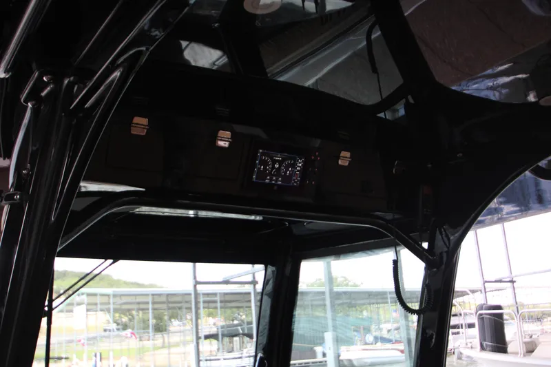 Slide: The Image of Interior view of 2024 HCB 42 Lujo boat cockpit with control panel. - 25