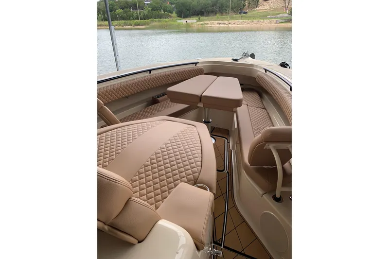 Slide: The Image of Luxurious interior of 2024 HCB 42 Lujo boat with elegant tan seating. - 19