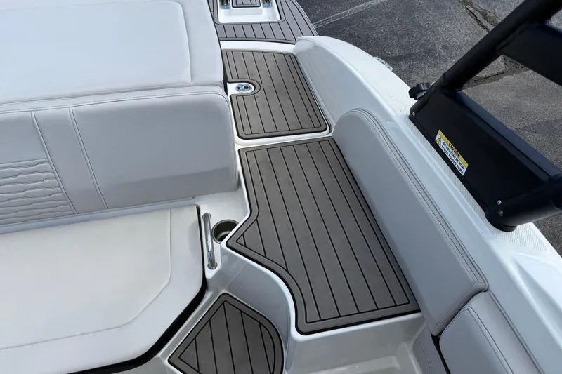 Slide: The Image of 2023 Sea Ray SPX 190 boat interior with sleek seating and non-slip flooring. - 20