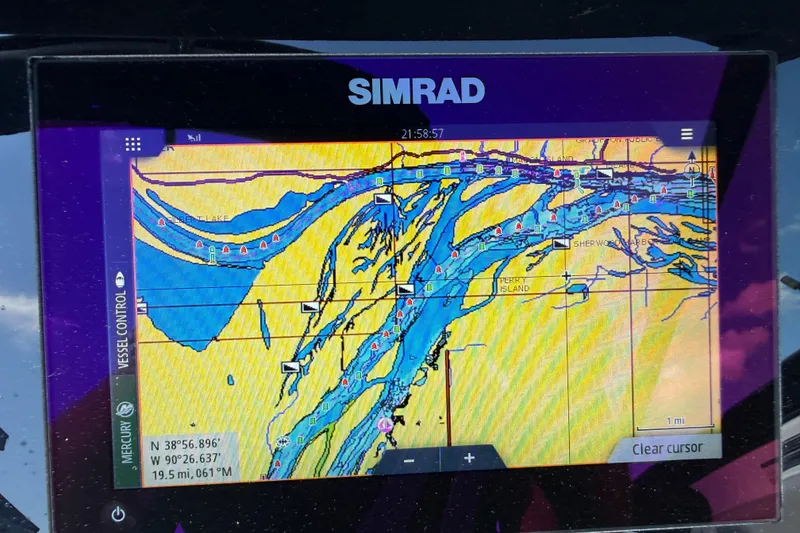 Slide: The Image of Simrad navigation display on 2023 Sea Ray SPX 190, showing detailed marine map. - 33