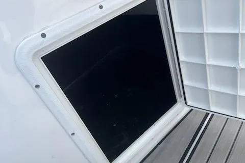 Slide: The Image of 2022 Hurricane SunDeck Sport 188 IO boat storage compartment with sleek design and durable materials. - 7