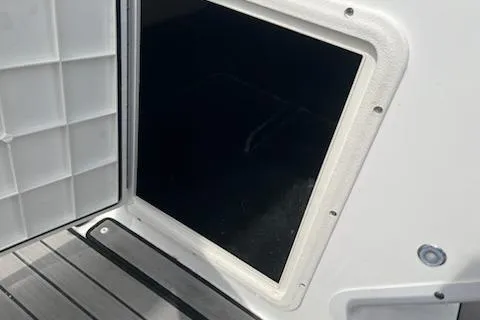 Slide: The Image of 2022 Hurricane SunDeck Sport 188 IO boat hatch detail with sleek design and durable materials. - 6