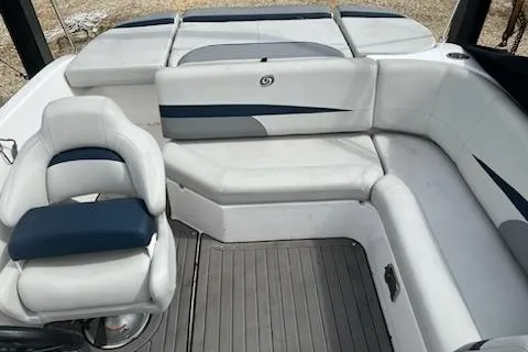 Slide: The Image of 2022 Hurricane SunDeck Sport 188 IO boat interior with white and blue seating. - 10