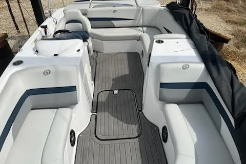 Slide: The Image of 2022 Hurricane SunDeck Sport 188 IO boat interior with spacious seating and sleek design. - 2