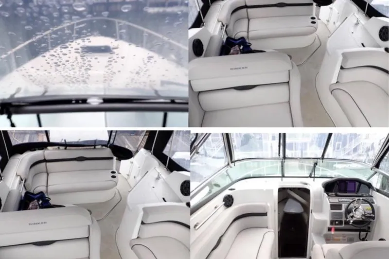 Slide: The Image of 2020 Rinker 270 Express Cruiser interior with white seating and modern dashboard. - 9