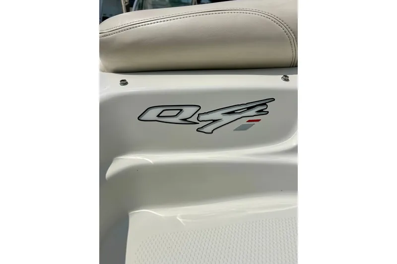 Slide: The Image of 2013 Tahoe Q4i boat interior with logo detail on white surface. - 30