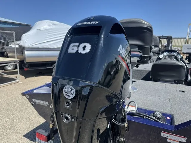 Slide: The Image of A 2021 Tracker Pro Team 175 TF with a 60 HP Mercury outboard motor. - 8