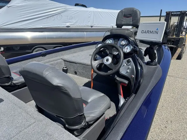 Slide: The Image of The image shows the cockpit of a 2021 Tracker Pro Team 175 TF boat with a Garmin device. - 12