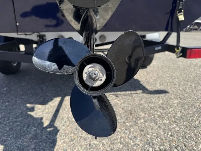 Slide: The Image of Close-up of a black propeller on a boat trailer. - 9