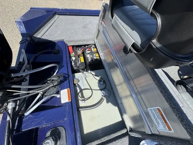 Slide: The Image of A view of the interior of a 2021 Tracker Pro Team 175 TF boat with battery compartment. - 32