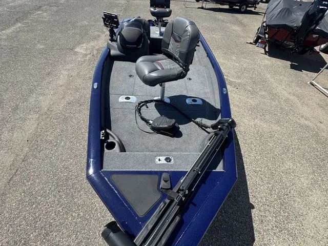 Slide: The Image of A 2021 Tracker Pro Team 175 TF with gray seats and a control unit on the deck. - 21