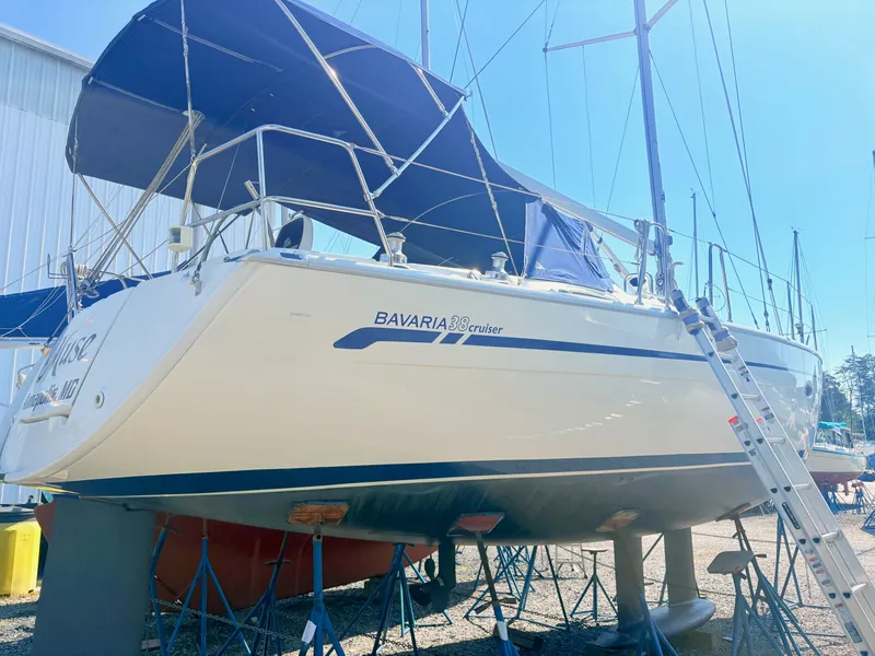 Slide: The Image of A 2008 Bavaria Cruiser 38 is on a dry dock, supported by stands. - 3