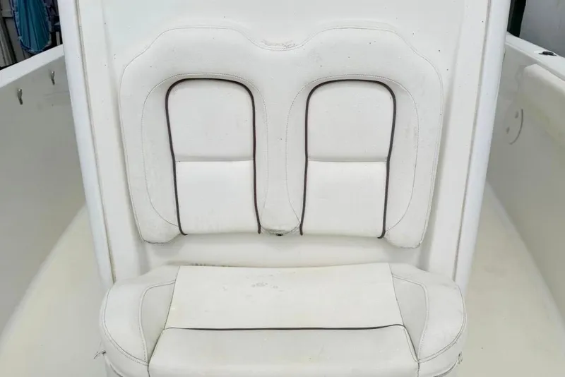 Slide: The Image of White seating on a 2018 Sea Hunt Gamefish 25 boat. - 10